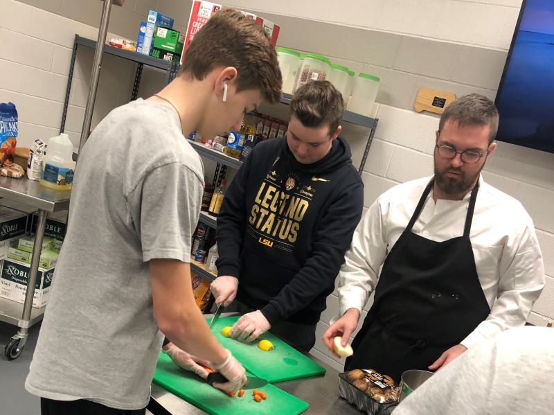 Students learn how to put together a recipe with Mr. Neb.