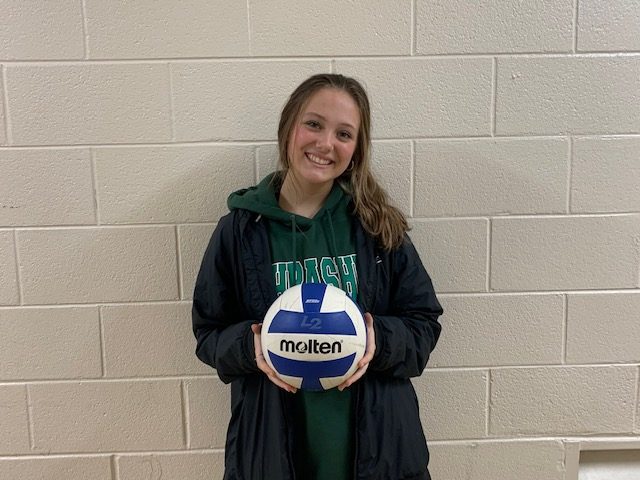 Jesse Barton poses with her volleyball