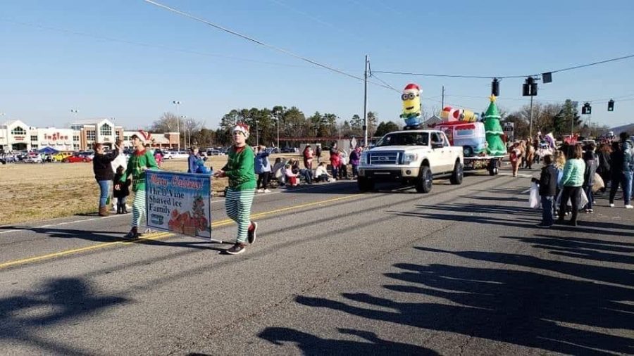 Community members march down Oak Ridge Highway during a past Karns Christmas Parade