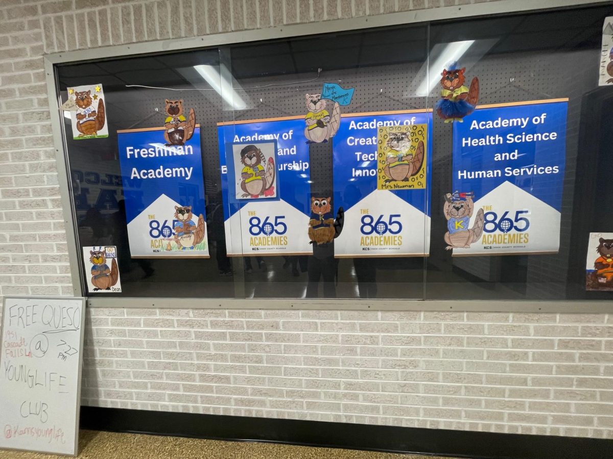 The four 865 Academies at Karns High School are displayed at the front of the building. 