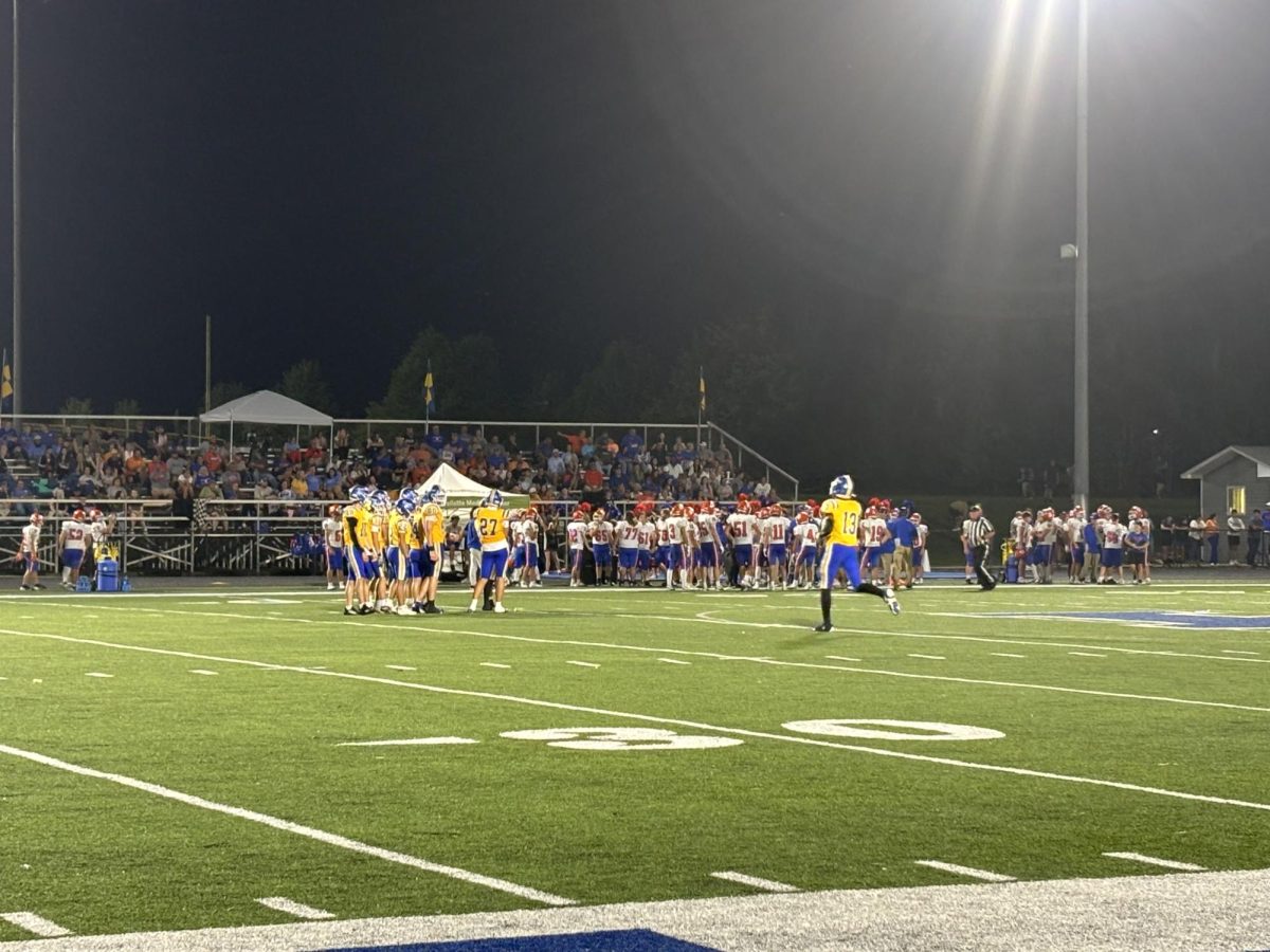 Beavers hit the field after a timeout during Friday's game against the Cougars. 