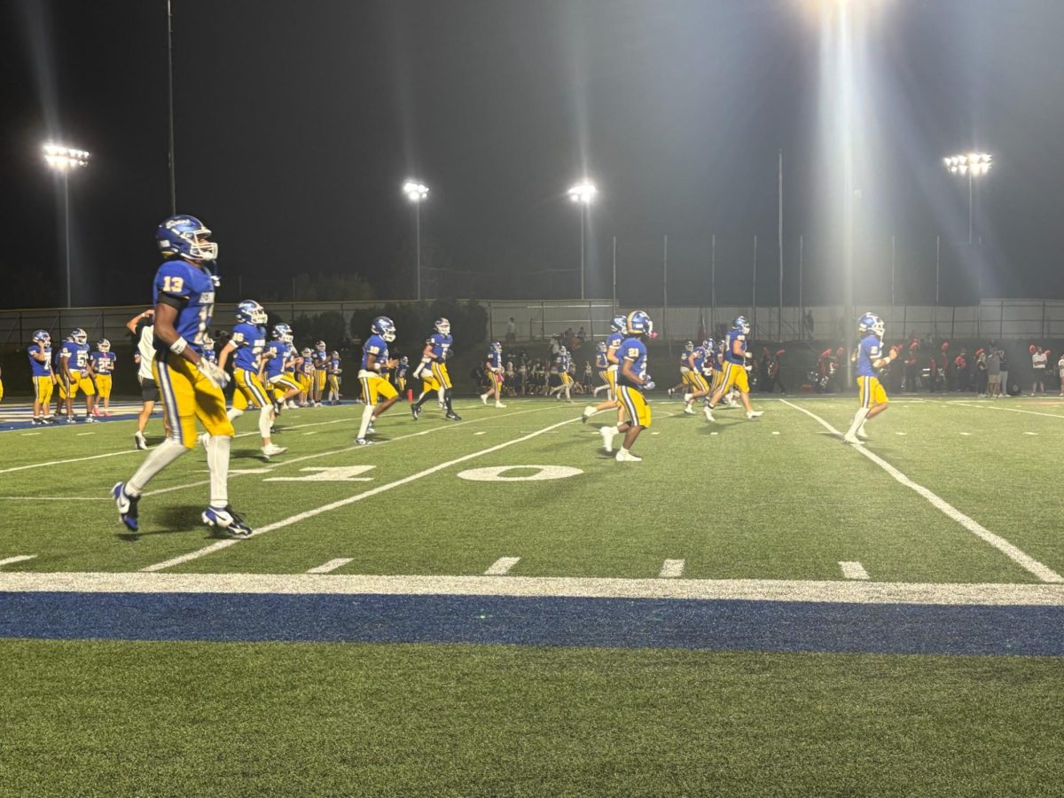 Beavers warm up before the third quarter against Powell. 