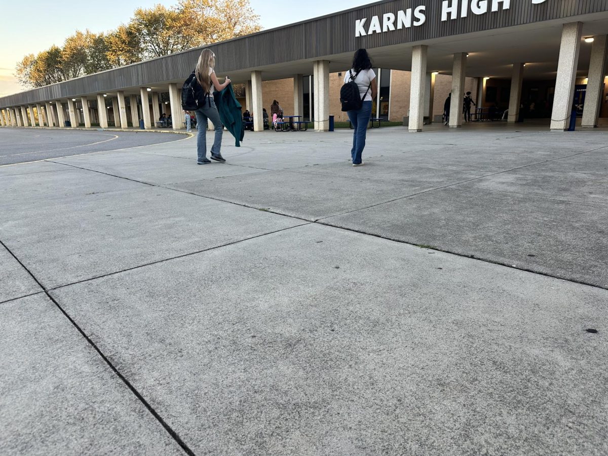 Students walk in to the building in the morning as they prepare for spirit week. 