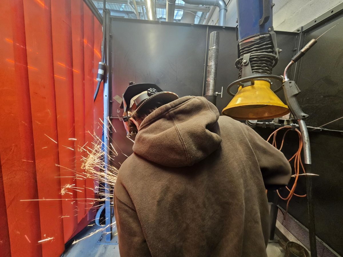 Alex Rowe works on a weld in preparation for the TCAT Welding Rodeo.
