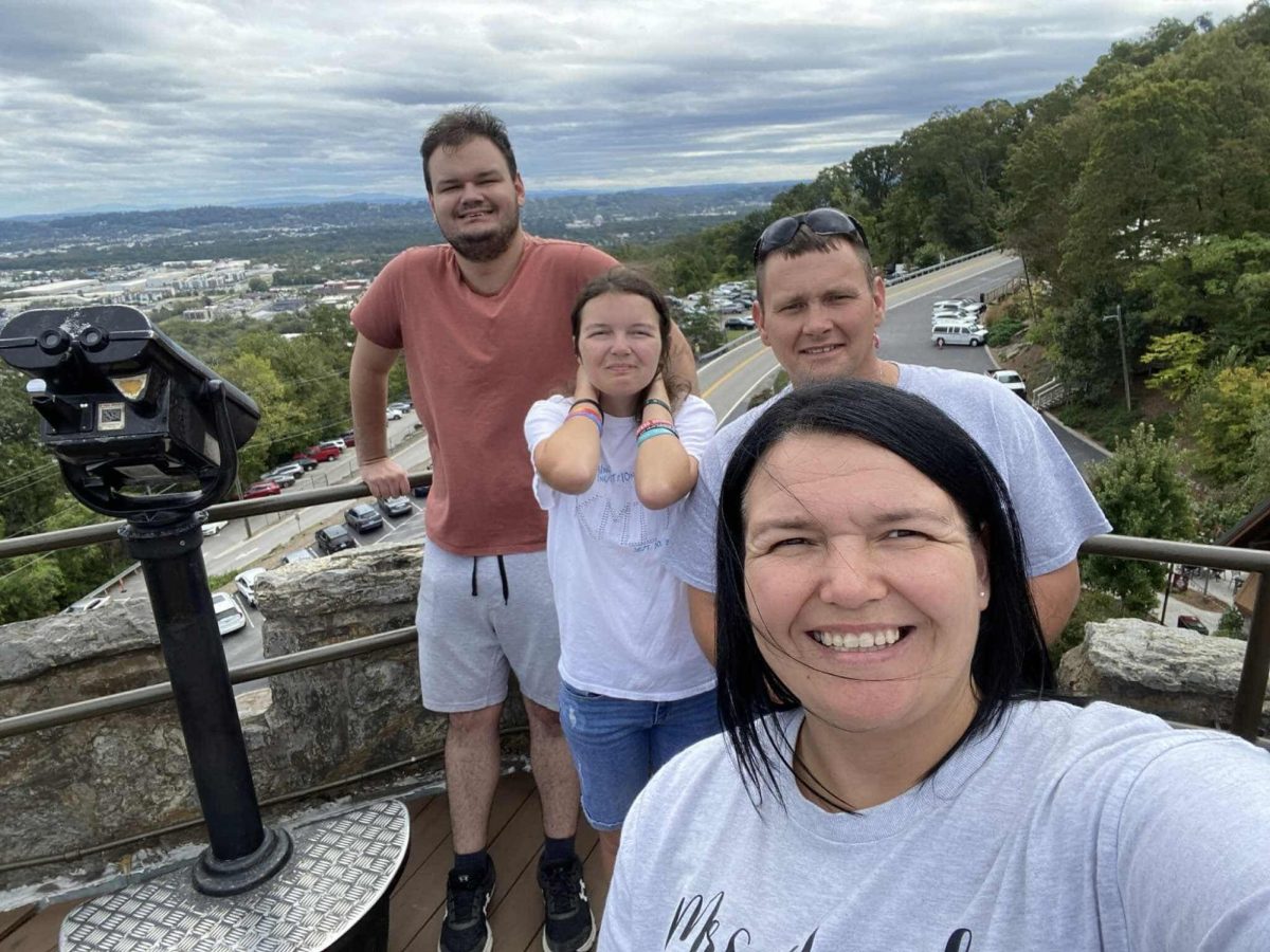 Ali Daugherty and her family pose for a photo at Lookout Mountain. 