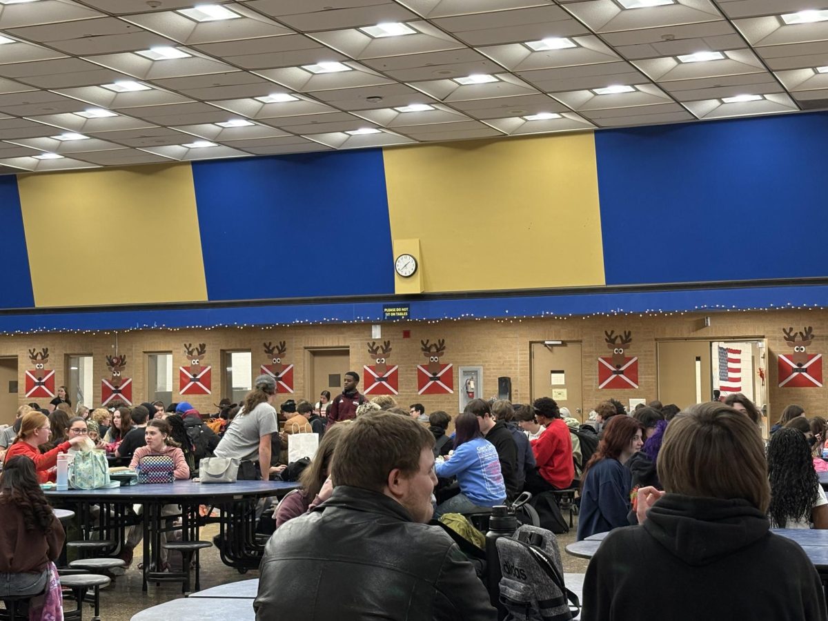 The Commons Area is decorated to look like a reindeer habitat for Cookies with Santa. 